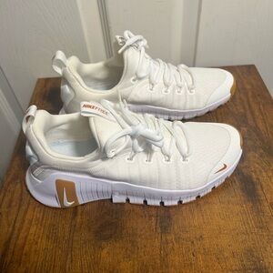 Nike Free women’s White and Tan Athletic Shoes NWOT